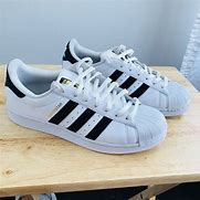 Image result for Adidas Tan Super Star