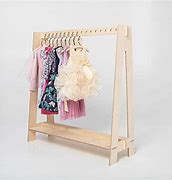 Image result for Child Shaped Clothes Hanger
