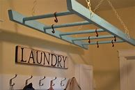 Image result for Laundry Room Retractable Clothes Hanger