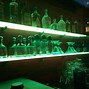 Image result for Lighted Glass Bar Shelves