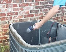 Image result for Cleaning A C Condenser Coils Outside