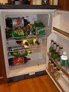 Image result for Bar Cabinet with Mini Fridge