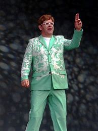 Image result for Elton John Orange Costume