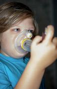 Image result for Child with Asthma Inhaler