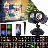 Image result for Outdoor Christmas LED Projection Light 16 Patterns Laser Light Projector Lamp For Xmas Holiday Garden Party - Black - Christmas Light Projectors