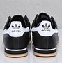 Image result for black adidas rom shoes