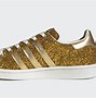 Image result for white and gold adidas shoes