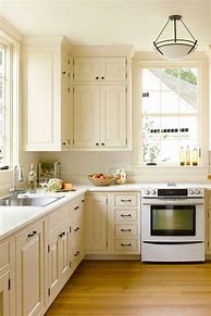 Image result for Kitchen Countertops with Light Wood Cabinets
