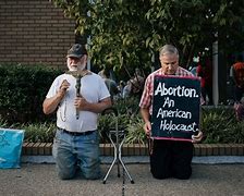 Image result for Anti-abortion activist climbs