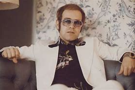 Image result for Elton John 70s Balding