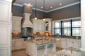 Image result for Antique White Kitchen Cabinets with Black Appliances
