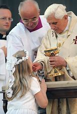 Image result for images priests giving first communion fifties