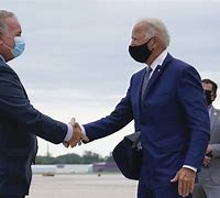 Image result for Photo of Biden and Beto Shaking Hands