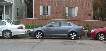 Image result for paralles parked cars on the street