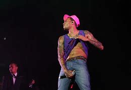 Image result for Chris Brown Takkies at House