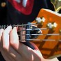 Image result for Kids Playing Bass Guitar