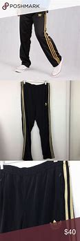 Image result for adidas track pants black and gold