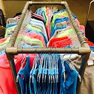 Image result for Hanging Clothes Rail with Storage