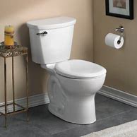 Image result for American Standard 215DA.104 Cadet Pro Round-Front Two-Piece Toilet With Everclean Surface And Powerwash Rim White Fixture Toilet Two-Piece Round
