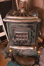 Image result for Large Cast Iron Wood Stove