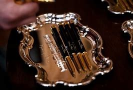 Image result for Pelosi%27s Gold Pens