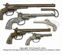 Image result for Antique Cast Iron Cap Guns for Sale