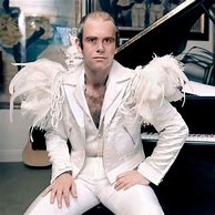 Image result for Elton John Pink and White Suit