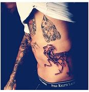 Image result for Chris Brown Skull Tattoo