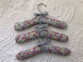 Image result for Crafts to Make with Baby Clothes Hangers