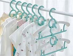 Image result for Plastic Baby Hangers Bulk
