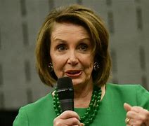 Image result for Nancy Pelosi Holding a Sign
