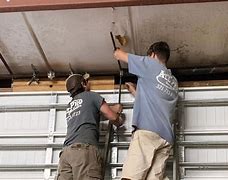 Image result for How to Repair a Garage Door