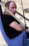 Image result for Does John Travolta Wear a Toupee