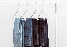 Image result for How to Hang Pants On Hangers with Clips