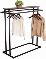 Image result for Clothes Rack Against Wall