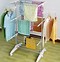 Image result for Shelf with Clothes Hanger in Laundry Room
