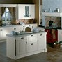 Image result for Light Wood Kitchen Cabinets with Tile Floor