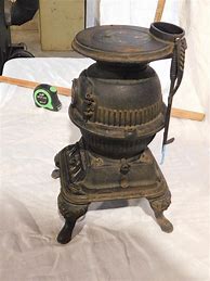 Image result for Pot Belly Stove Antique