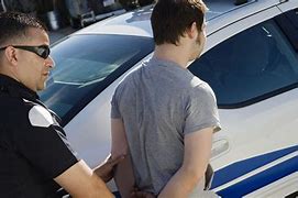 Image result for Picture of a Man Getting Arrested