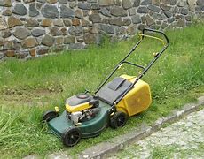 Image result for Lawn Mower Mowing Grass