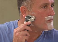 Image result for Norelco Shaver 7700 Series 7000 Wet And Dry Electric Shaver (S7740)