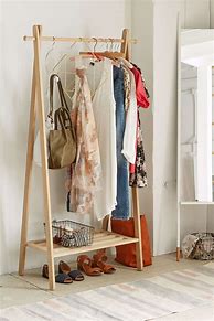 Image result for Wood Clothing Rack Design