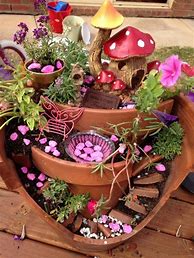Image result for Fairy Garden Made From Broken Pots