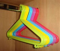 Image result for Plastic Clothes Hangers Child