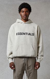 Image result for Fear of God Essentials Hoodie Cream