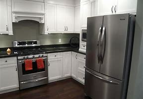 Image result for White Kitchen Cabinets with Black Stainless Steel Appliances