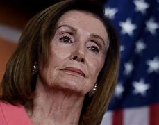 Image result for Pelosi with Documents