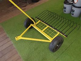 Image result for Pull Behind Rake Lawn Tractor