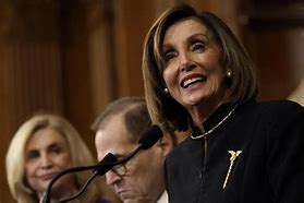 Image result for Nancy Pelosi with Eagle Lapel Pins