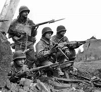 Image result for WWII US Soldiers in Battle